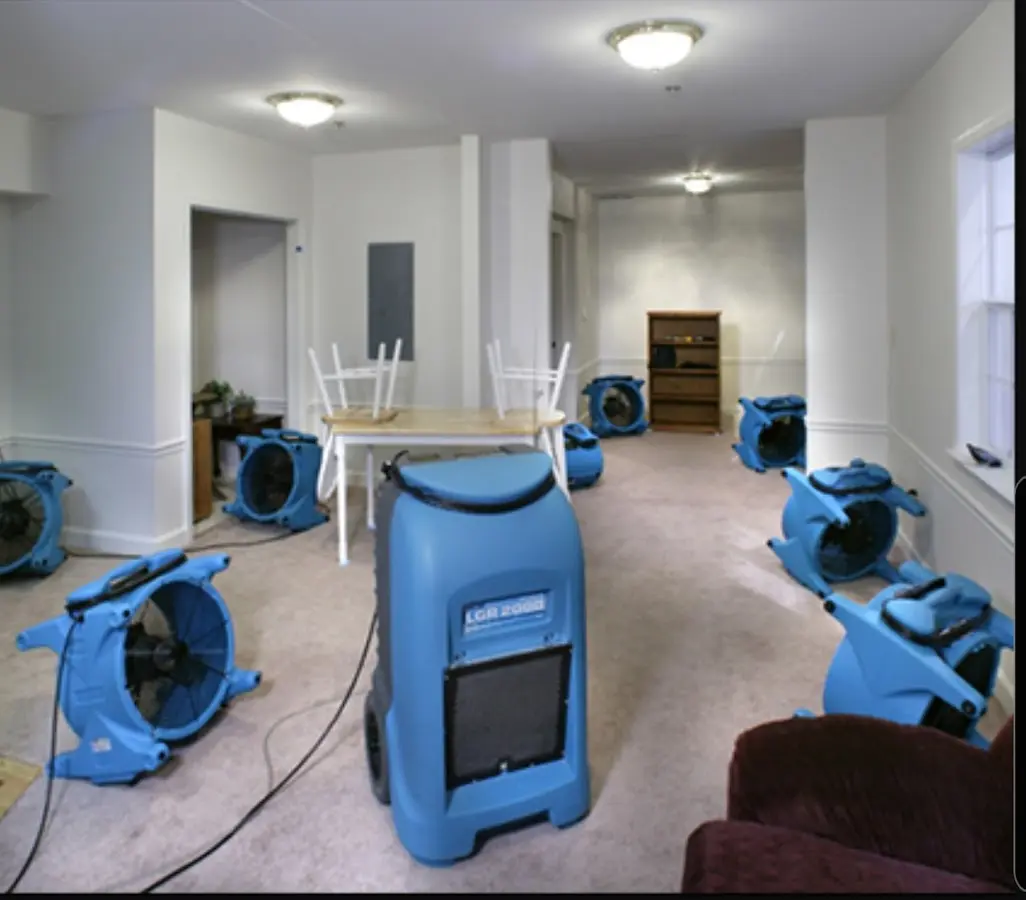 Air movers and dehumidifier setup for Water Extraction & Removal in Crookston